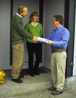 Ron Regan with satisfied client